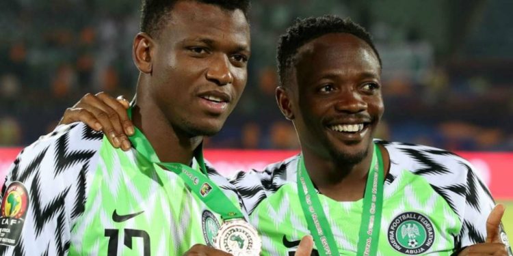 Ahmed Musa and Shehu Abdullahi celebrating third place victory at 2019 Africa Cup of Nations